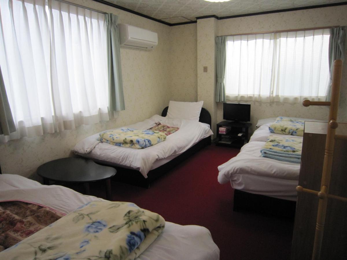 Quadruple Room with Shared Bathroom