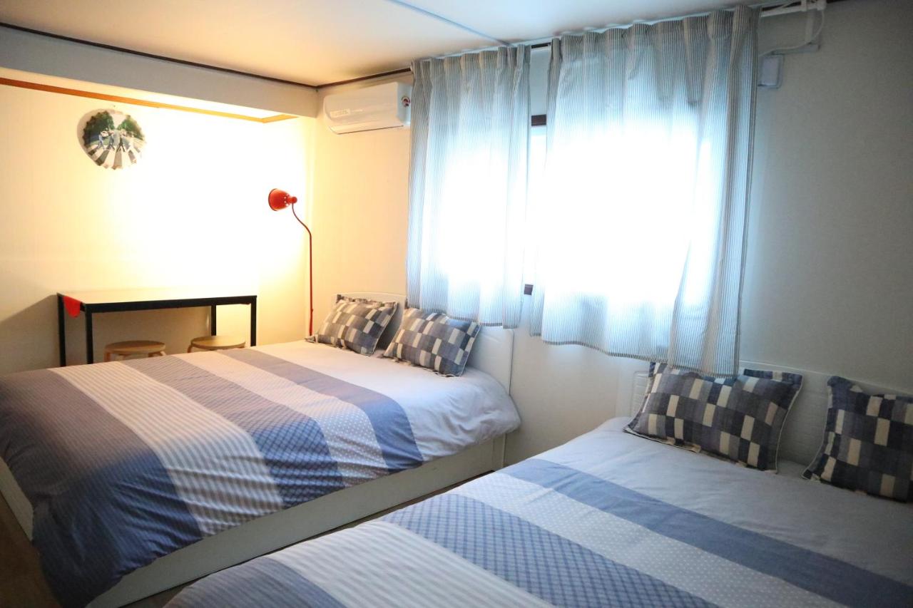 Economy Quadruple Room with Shared Bathroom