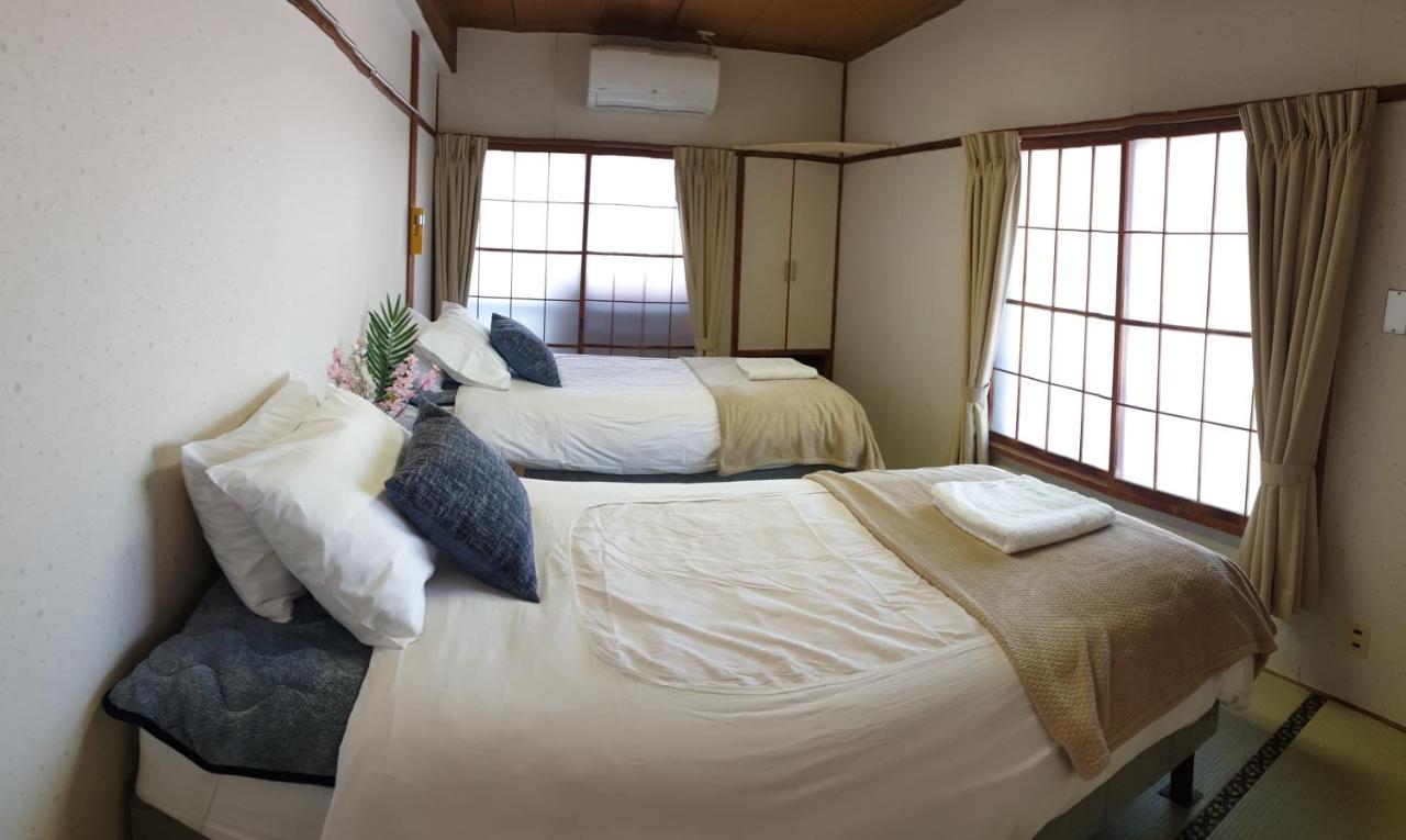 Double or Twin Room with Shared Bathroom