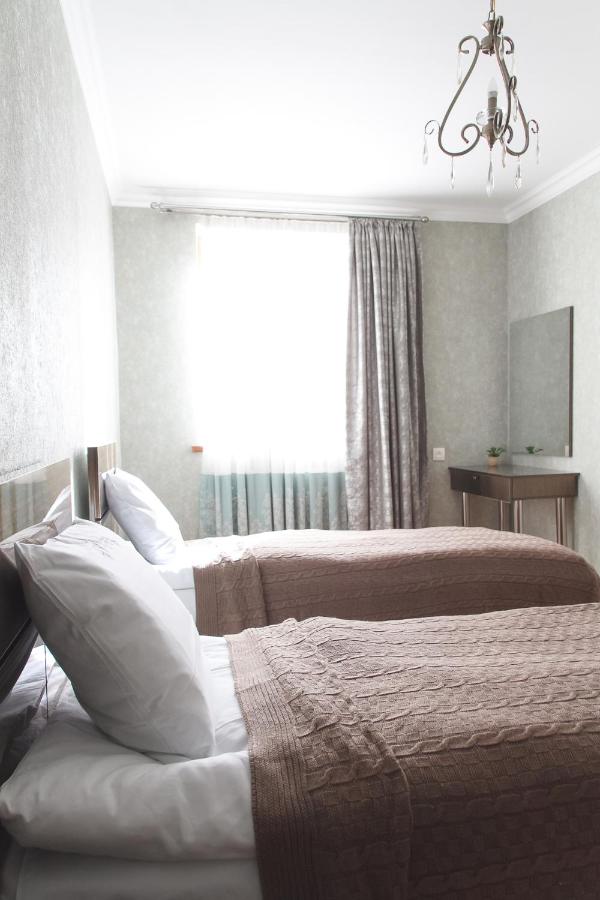 Camera Doppia con Letti Singoli con Vista Giardino