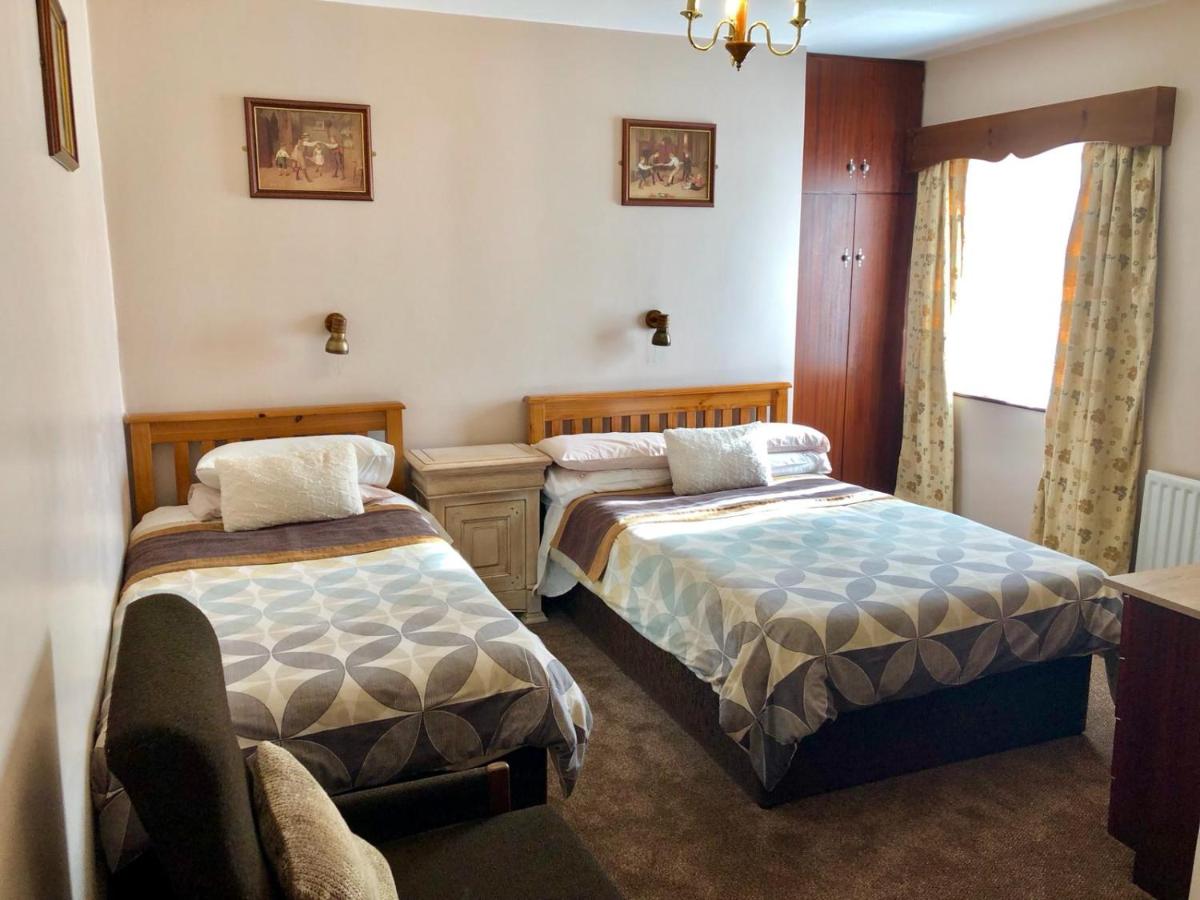 Chambre Triple avec Salle de Bains Commune