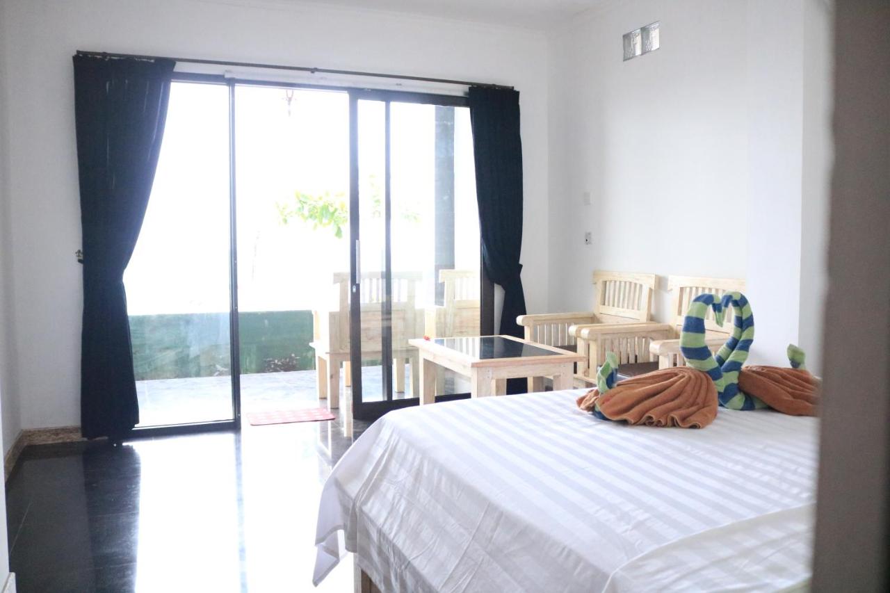 Zimmer mit Queensize-Bett und Meerblick