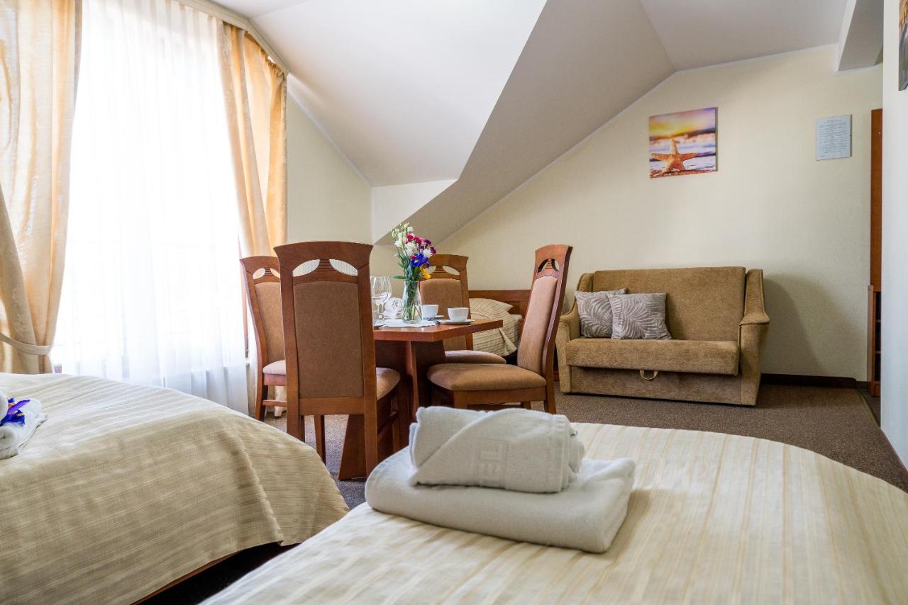 Standard Quadruple Room with Kitchenette