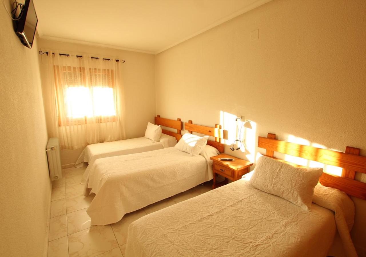 Dreibettzimmer mit Bergblick