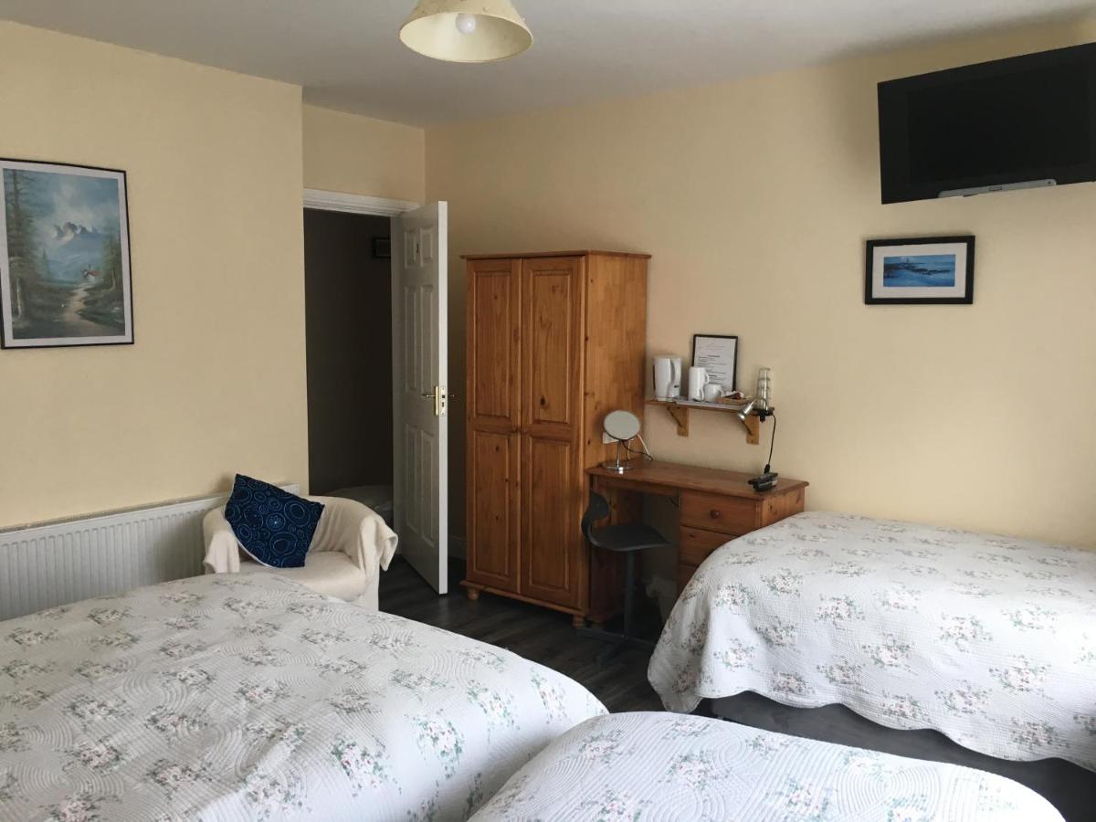 Quadruple or Triple Room with Private Bathroom