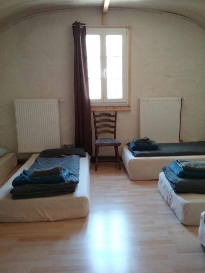 Single Bed in Dormitory Room