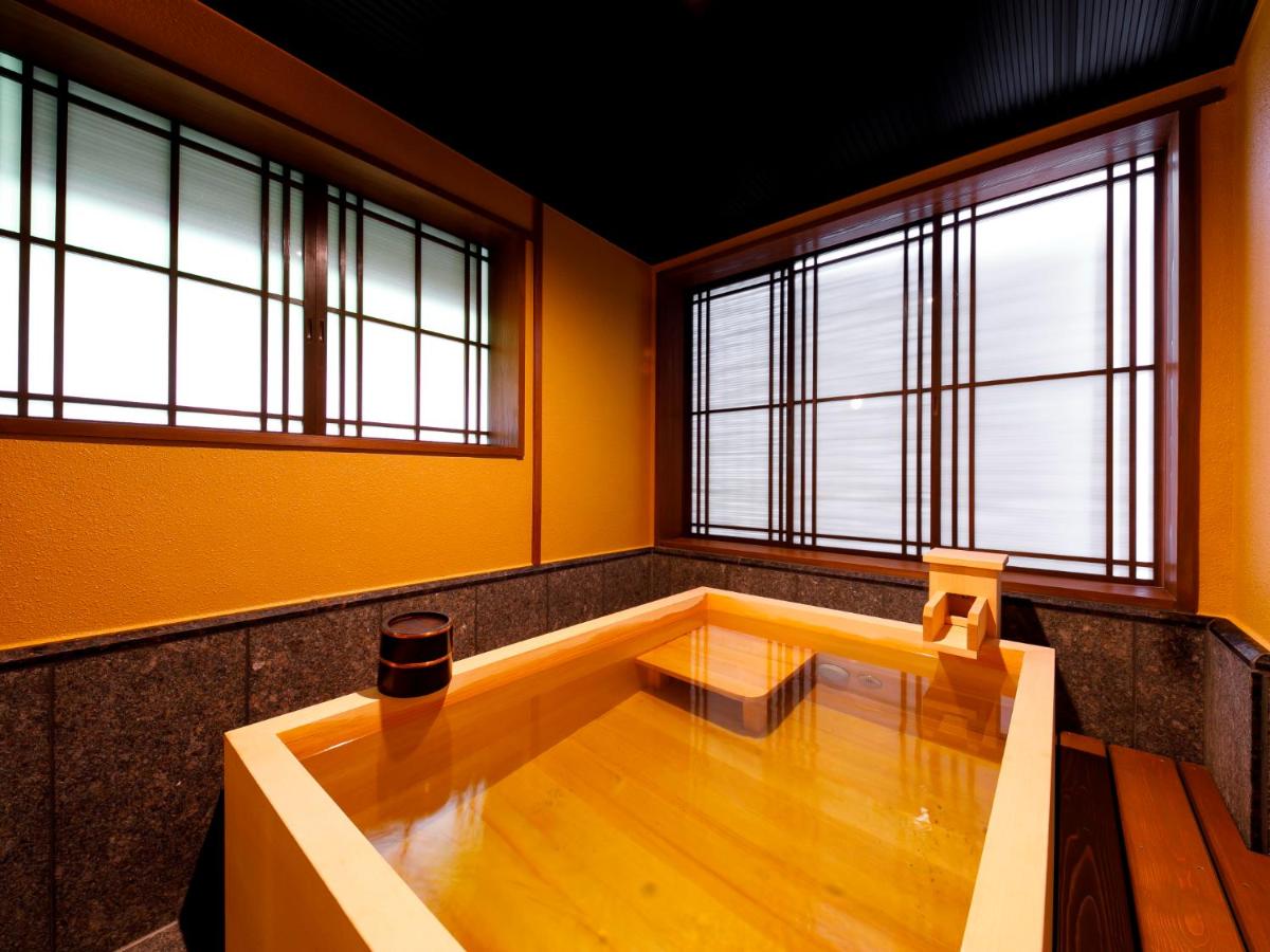 Camera con Area Tatami e Vasca Termale