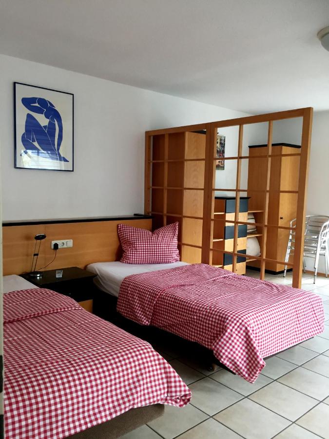 Dreibettzimmer mit Balkon