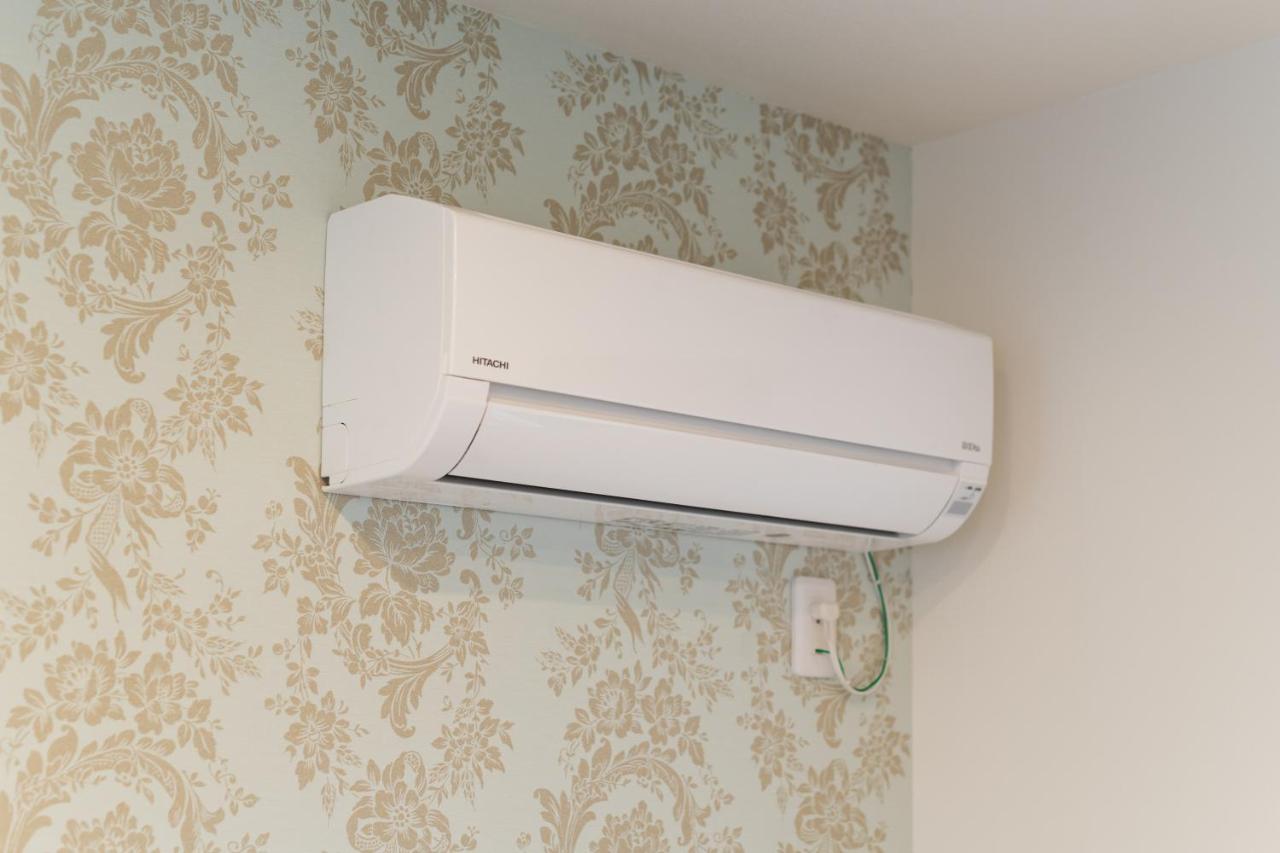 Camera Quadrupla Superior