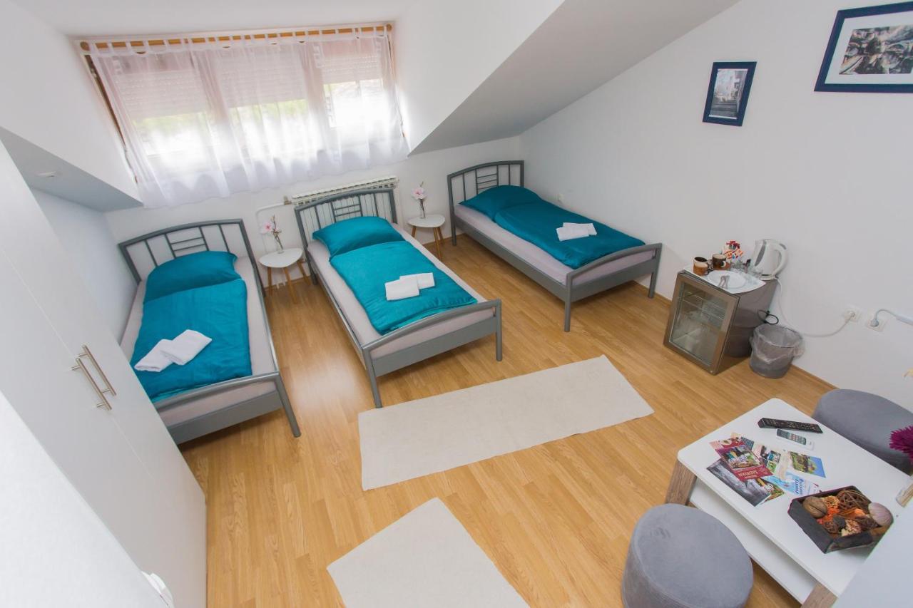 Camera Tripla con Bagno in Comune
