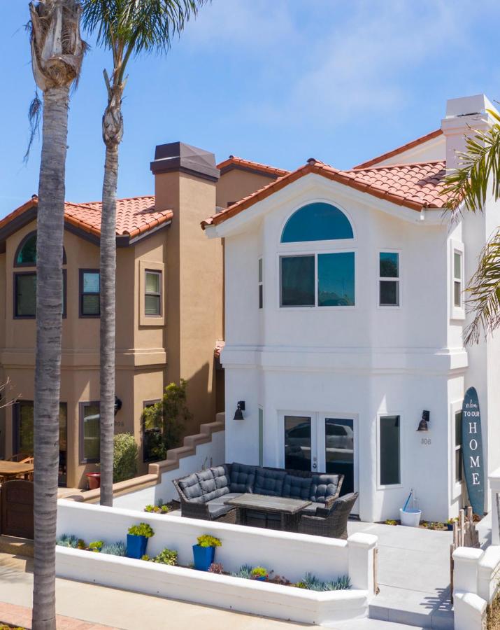 The White House with spa, bikes and steps to the beach and down town main street shops and dining - B&B