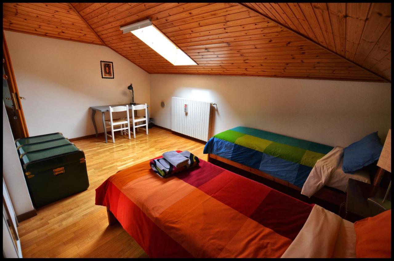 Camera Matrimoniale/Doppia con Letti Singoli con Bagno in Comune