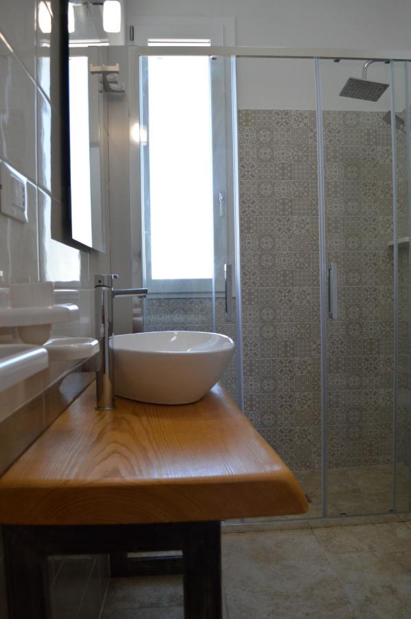 Camera Quadrupla con Vista Giardino 