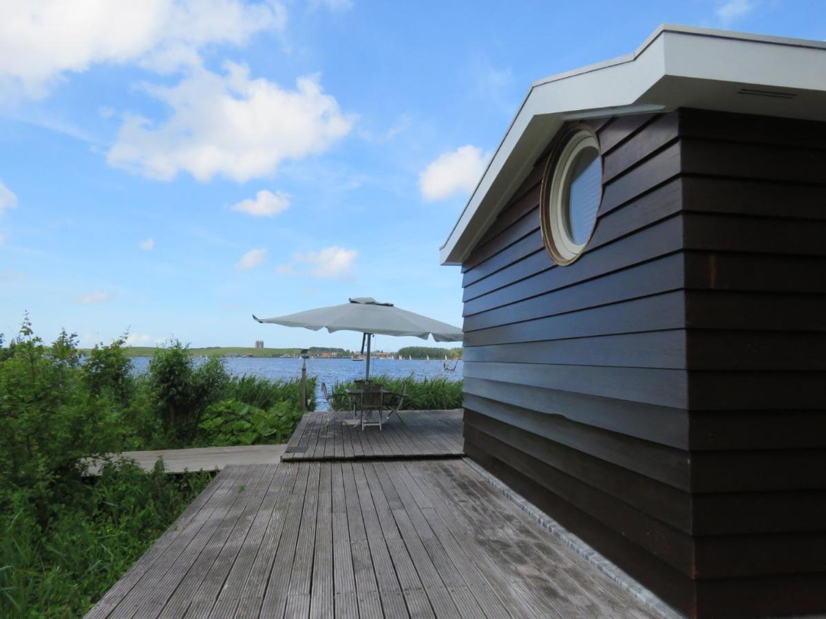 Vakantiehuis aan De Mooie Nel - Bed and Breakfast Spaarndam