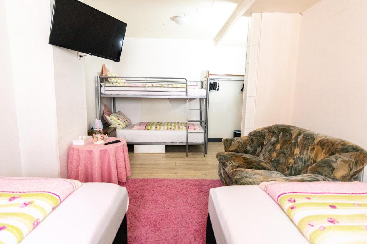 Quadruple Room with Shared Bathroom