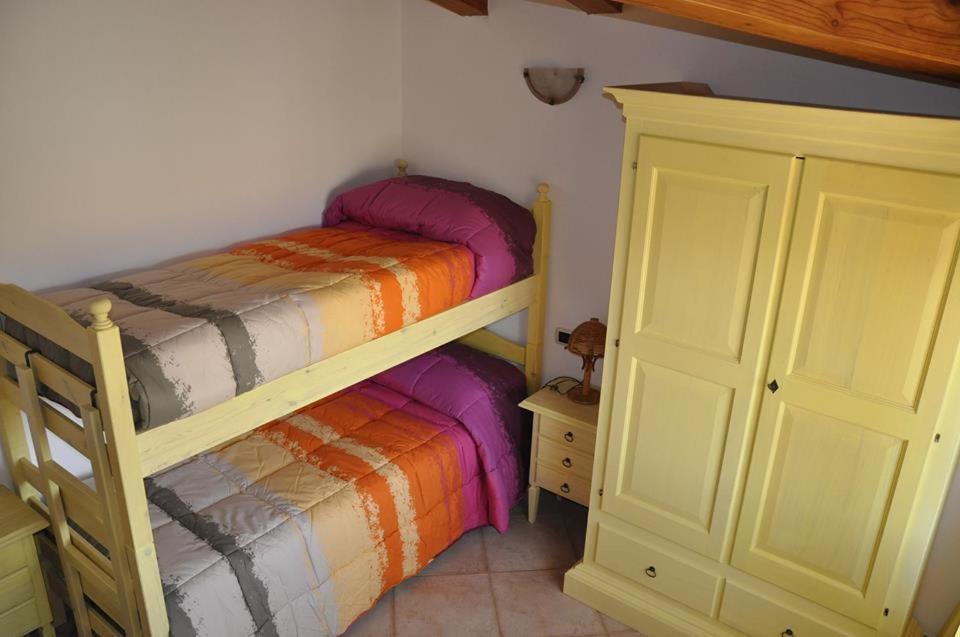 Camera Doppia con Letti Singoli e Bagno in Comune
