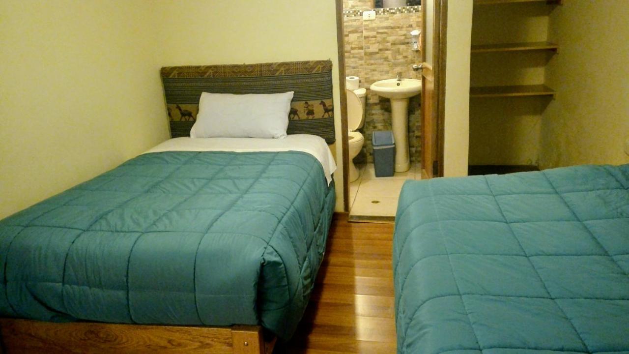 Tweepersoonskamer met 2 Aparte Bedden