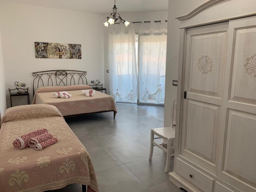 Dreibettzimmer mit Balkon