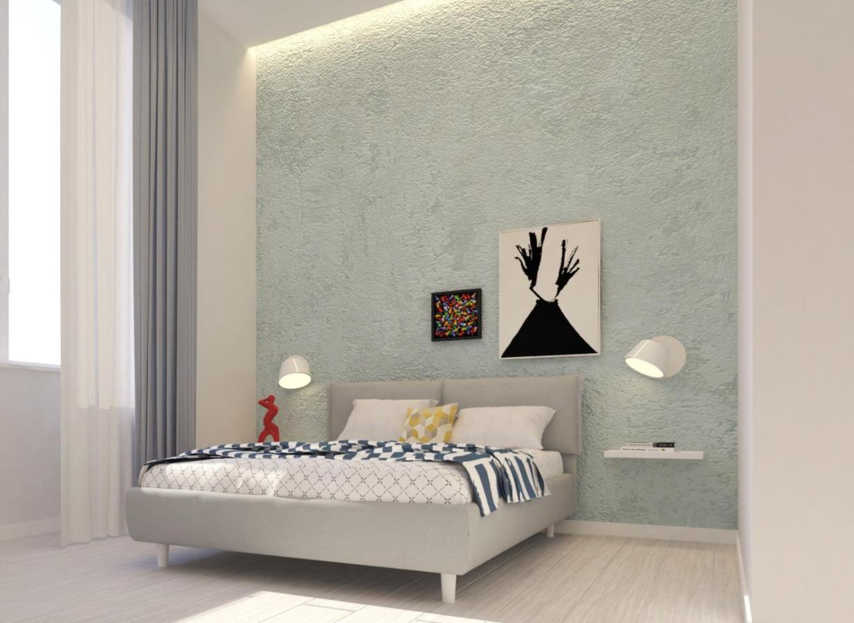 Camera Quadrupla Superior