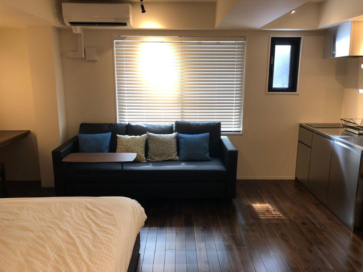 Habitación Doble con sofá cama y baño privado