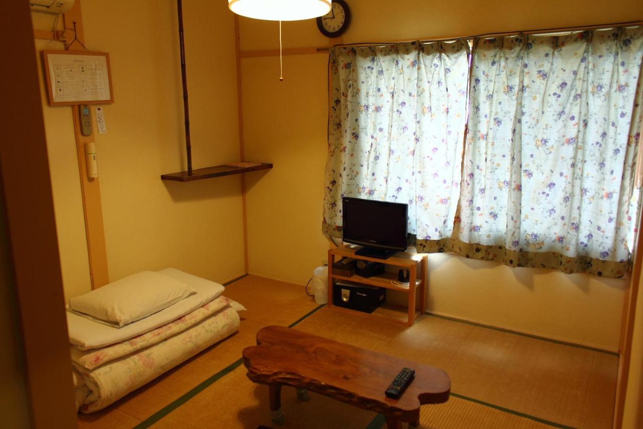 Camera in Stile Giapponese con Bagno in Comune