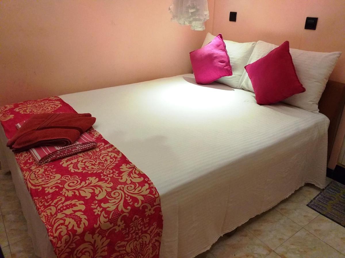 Single or Double Room with Private Bathroom and Fan