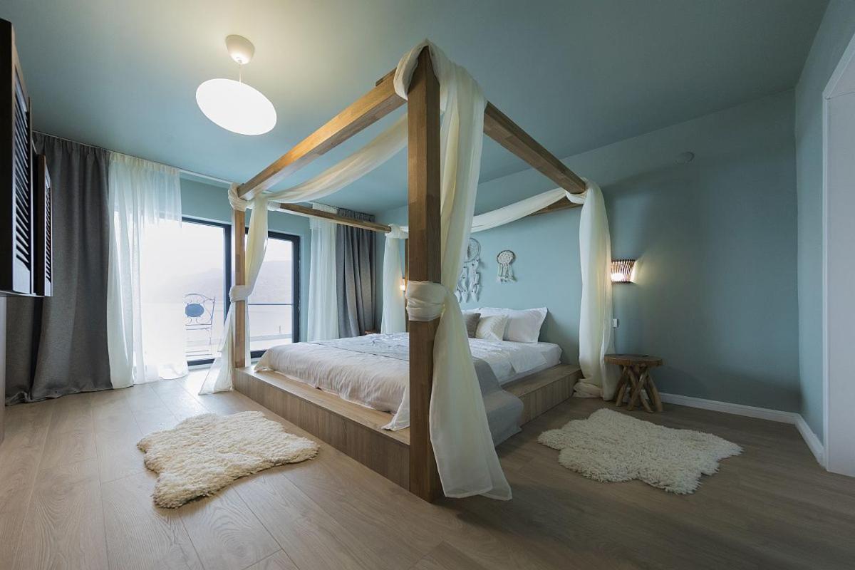 Suite mit Kingsize-Bett und Balkon