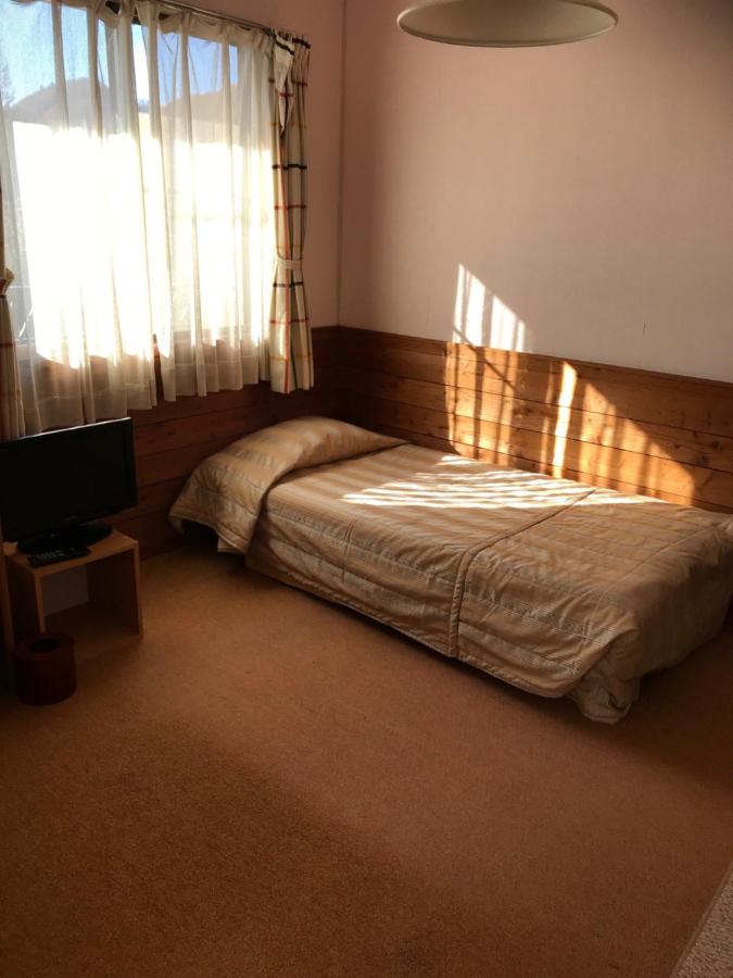 Quadruple Room with Shared Bathroom