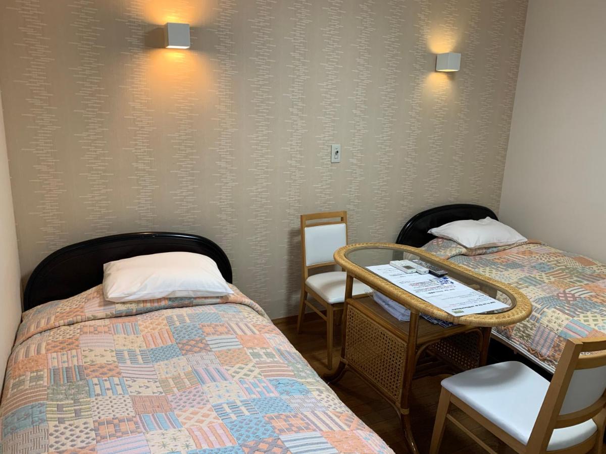 Tweepersoonskamer met 2 Aparte Bedden