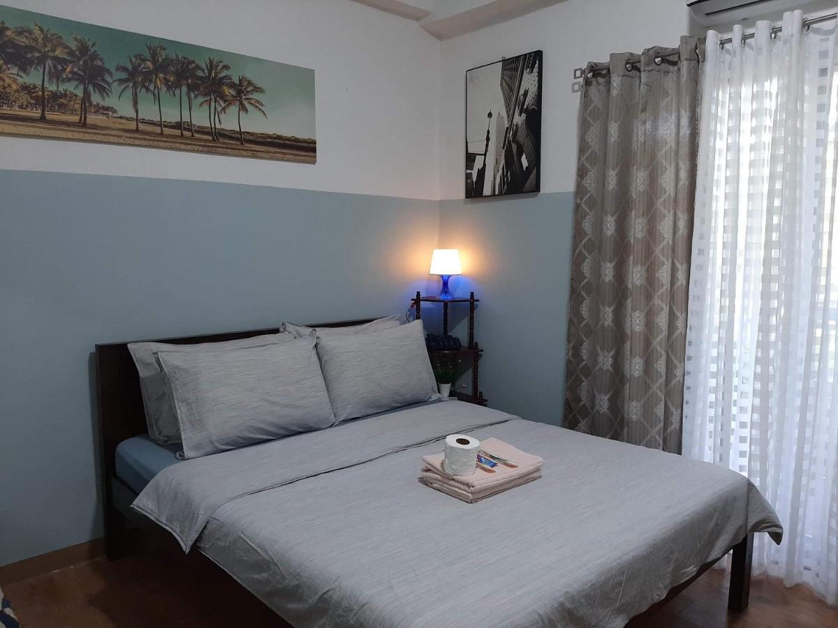 B&B Mactan - Cozy condo unit 5mins from Mactan Cebu Int'l Airport with Netflix - Bed and Breakfast Mactan