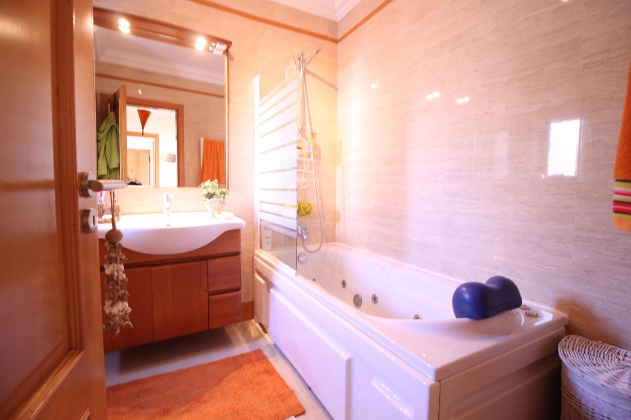 Casa da Palmeira Beach Apartment - Chambres d’hôtes