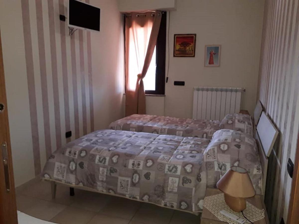 Tweepersoonskamer met 1 of 2 Bedden en Gedeelde Badkamer
