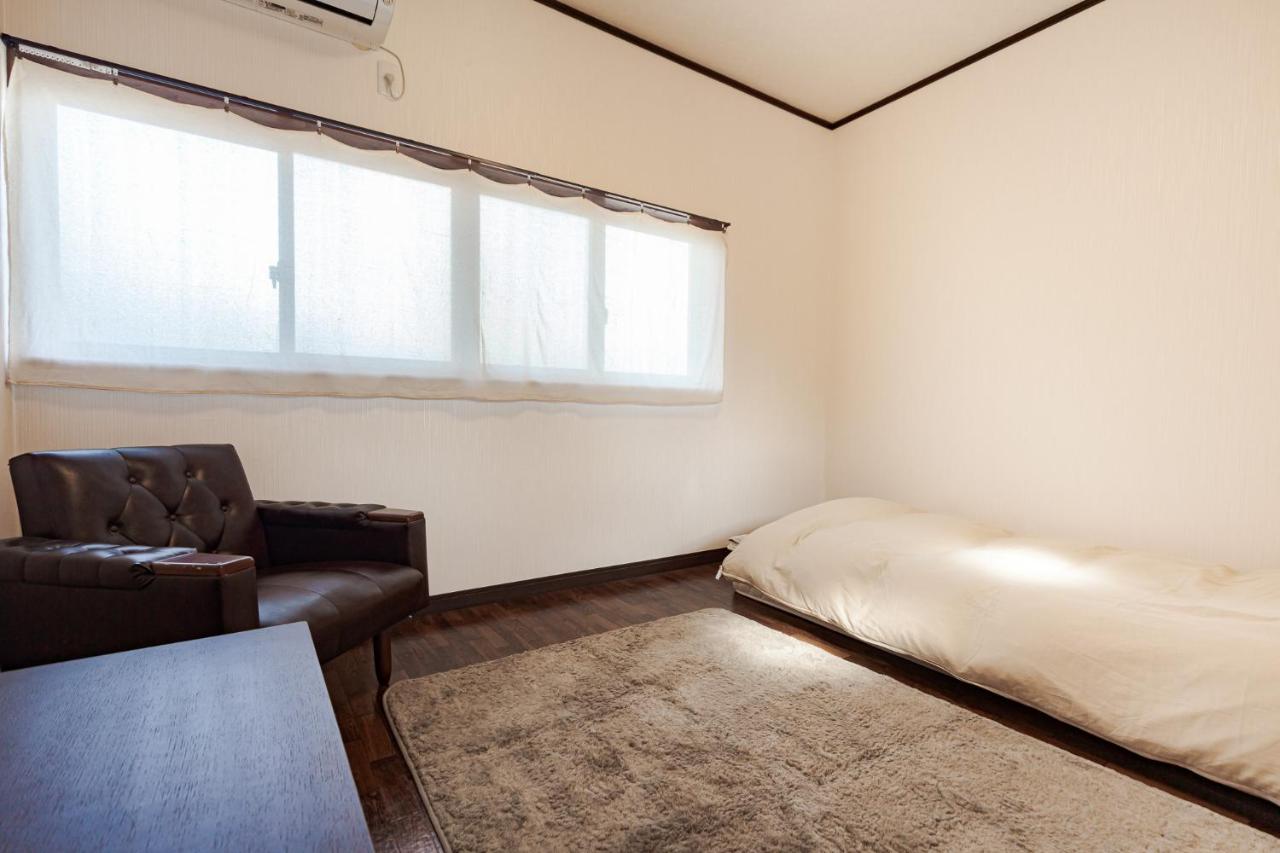 Single Room with Shared Shower and Toilet