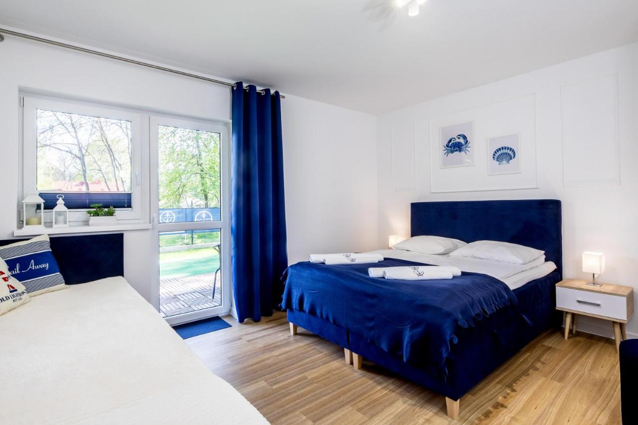 Apartament 2B Niebieskie Apartamenty Poddąbie z basenem krytym, odkrytym, salą zabaw, animacjami - Chambres d'hôtes Poddąbie