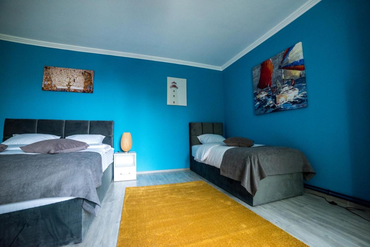 Dreibettzimmer mit Balkon