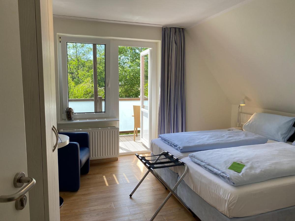 Doppel- oder Zweibettzimmer