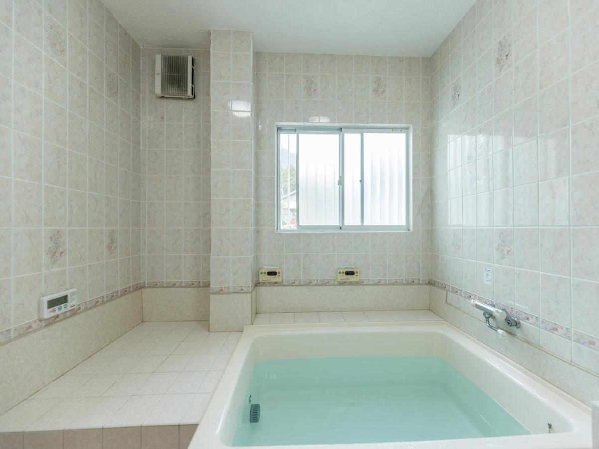 Camera Quadrupla in Stile Giapponese con Bagno in Comune - Non Fumatori