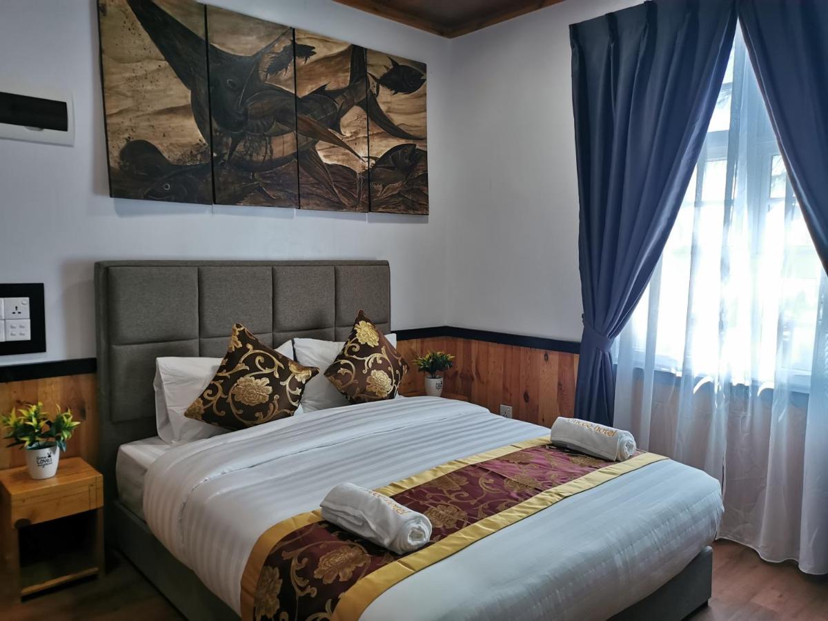 Habitación Doble Deluxe con vistas laterales al mar