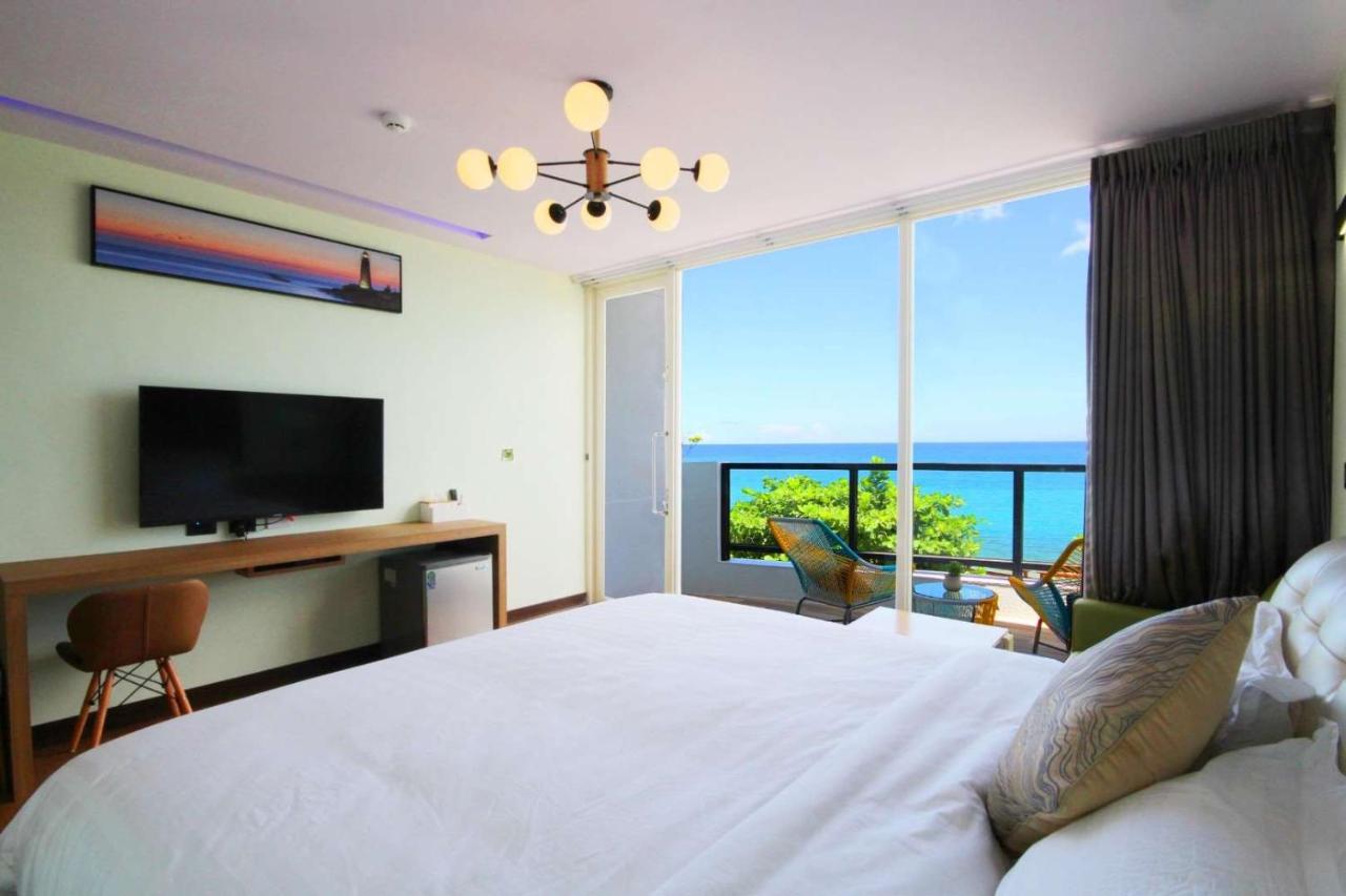 Habitación Doble Deluxe con balcón y vistas al mar