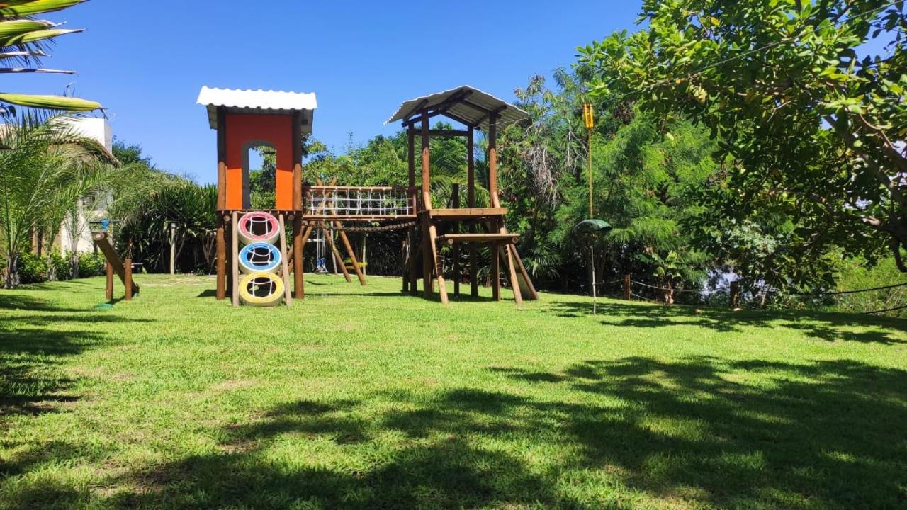 Guarajuba Porto Smeralda Village C02, térreo - GUARAJUBA TEMPORADA, viva mais de uma experiência de hospedagem conosco! 130m da praia - Ferienwohnung Guarajuba