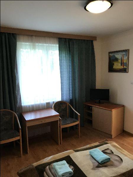 Chambre Triple avec Salle de Bains Commune