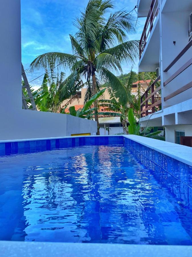 Pousada Primeira Praia Suítes - Bed and Breakfast
