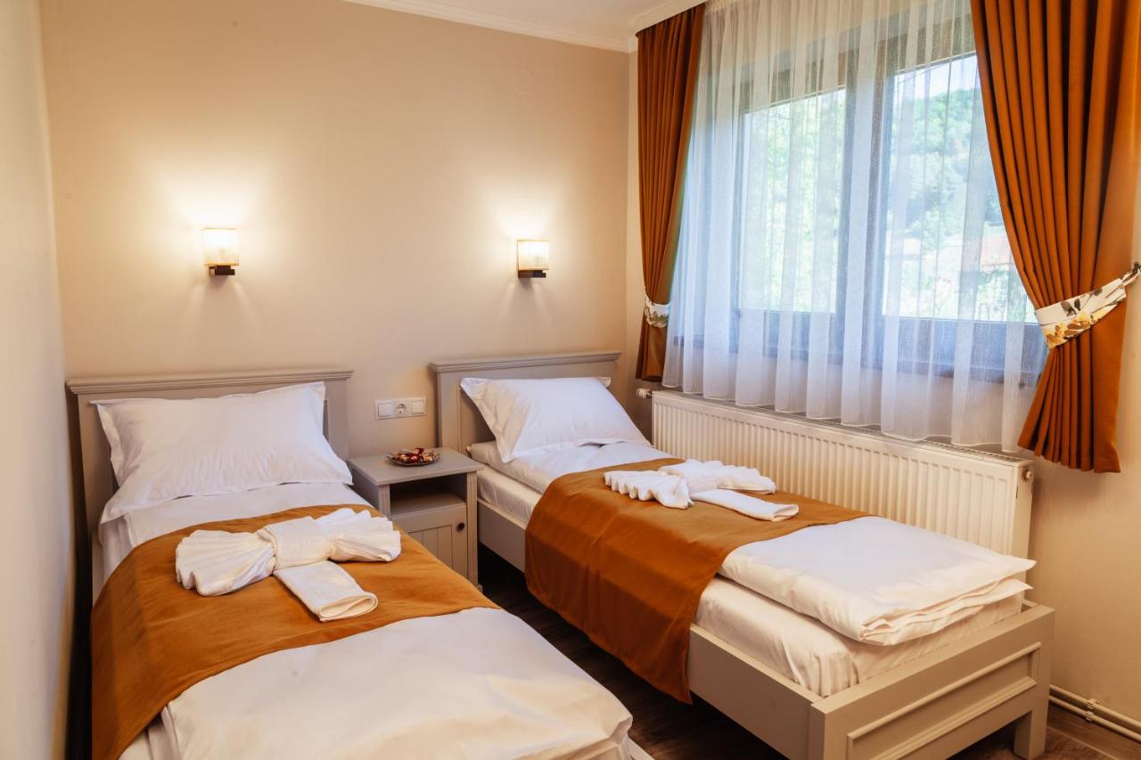 Camera Piccola Doppia con Letti Singoli