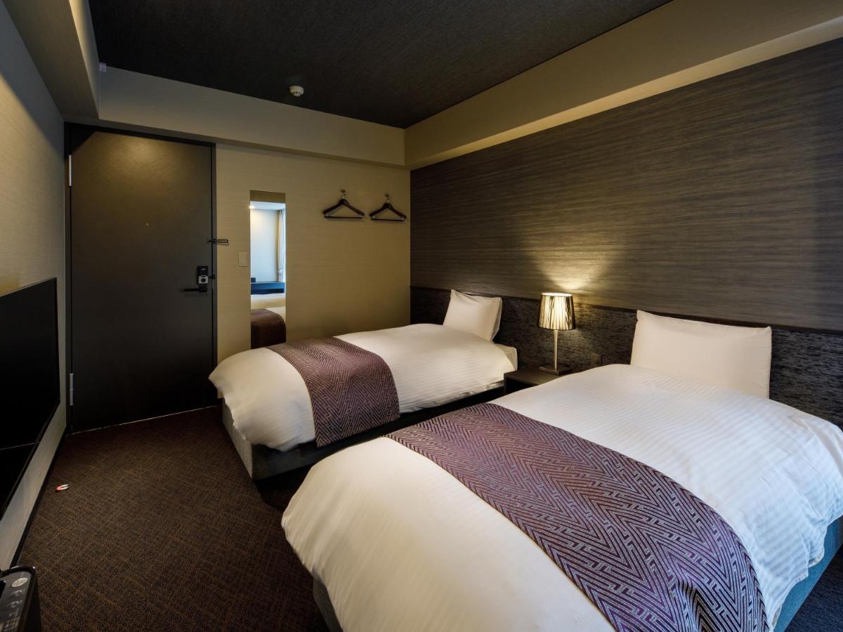 Camera Doppia con Letti Singoli con Bagno Privato 