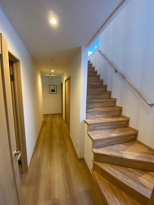 Tanuki House with spacious living room close to Rusutsu Resort - Chambres d'hôtes Rusutsu