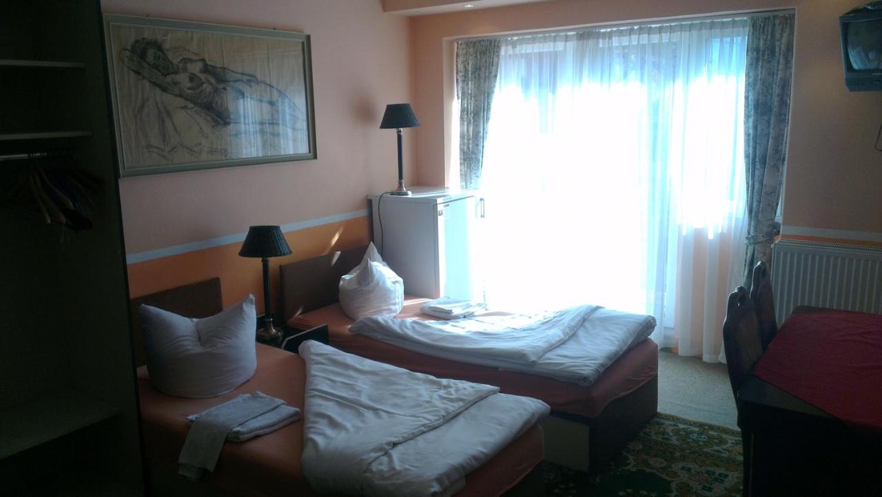Camera Quadrupla con Bagno in Comune