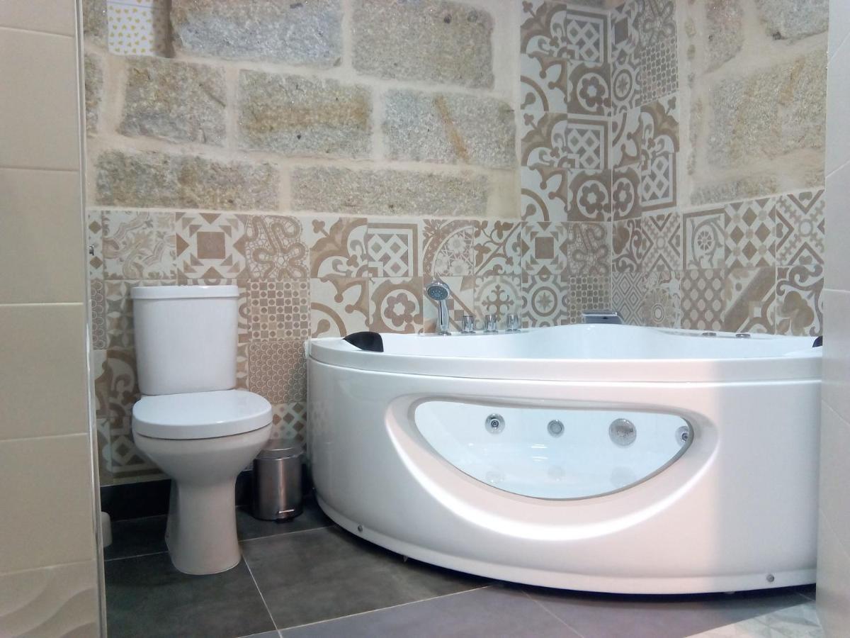 Chambre Lit King-Size avec Baignoire Spa