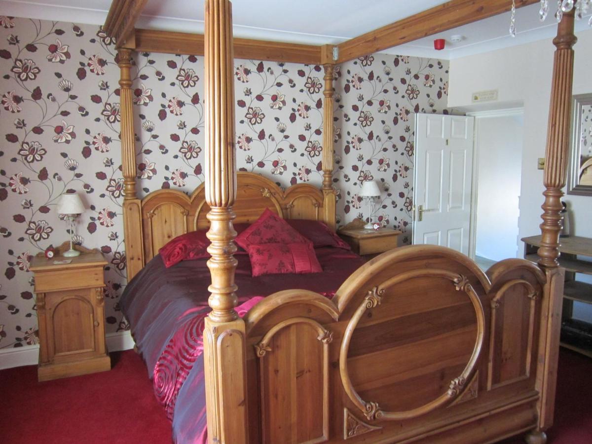 Deluxe Kamer met een Kingsize Hemelbed