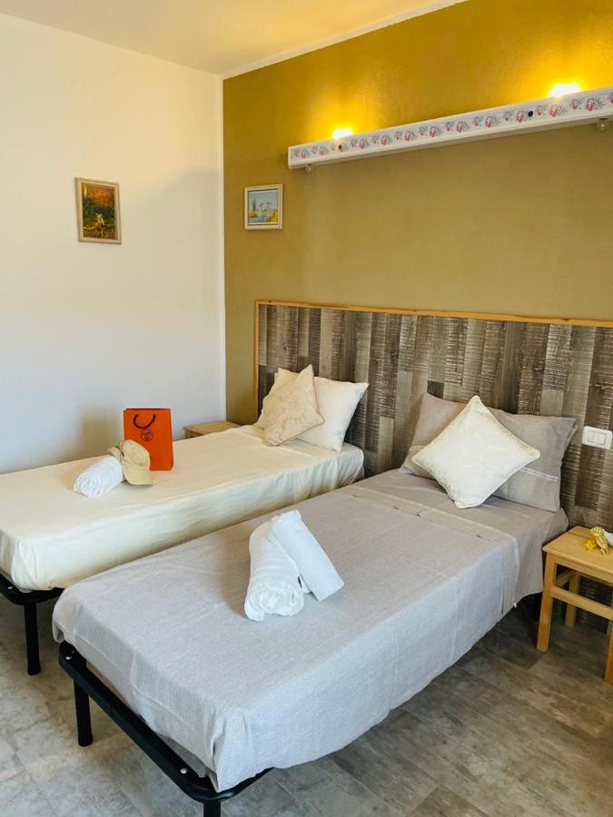 Tweepersoonskamer met 1 of 2 Bedden en Eigen Badkamer