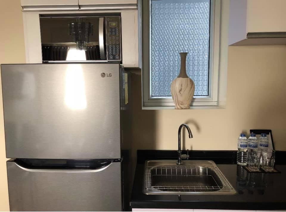 Homey Comfy CondoTel - Avida Towers Davao - Bed and Breakfast Davao